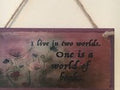 “I Live in Two Worlds, One Is a World of Books” – Gilmore Girls Plaque