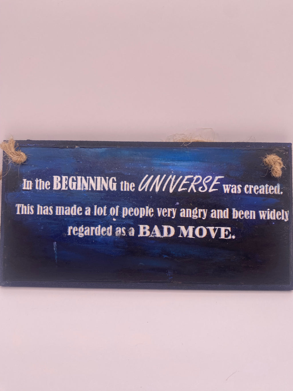 Hand‑Painted Wooden Plaque – “In the beginning the universe was created..." Douglas Adams inspired literary sign (6x3", 7x4”, 8x4”)