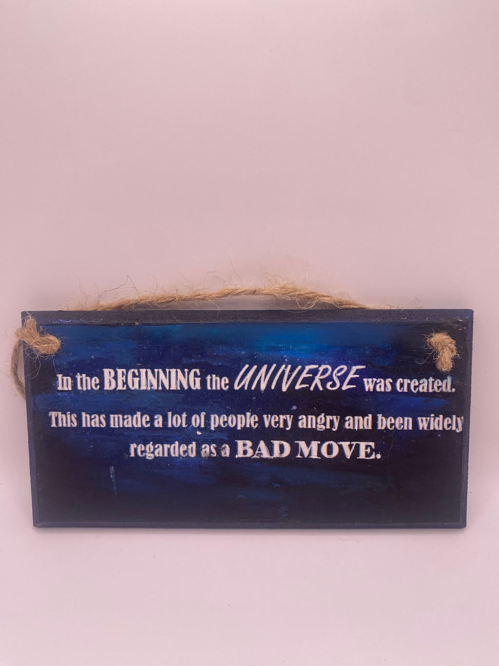 Hand‑Painted Wooden Plaque – “In the beginning the universe was created..." Douglas Adams inspired literary sign (6x3", 7x4”, 8x4”)