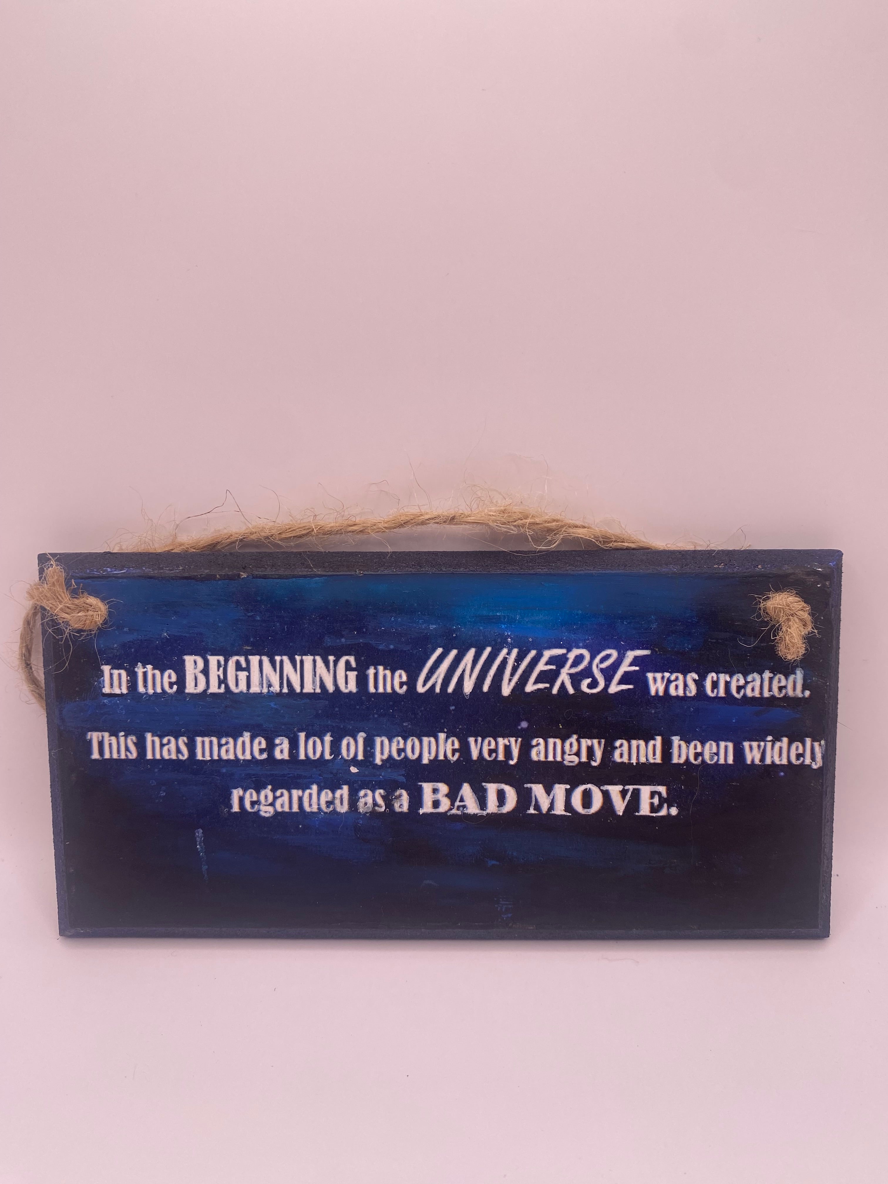 Hand‑Painted Wooden Plaque – “In the beginning the universe was created..." Douglas Adams inspired literary sign (6x3", 7x4”, 8x4”)